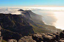 Clouds over the cliffs of Table Mountain above the Cape coast, South Africa